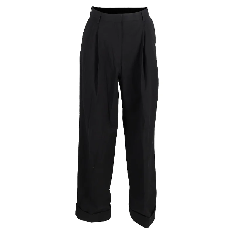 women's cotton pantsDries Van Noten Pleated High-Waist Wide-Leg Trousers in Black Wool